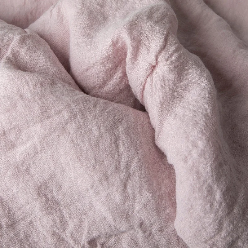 Fleece blankets for a cozy and plush textureBlush Pink Linen Quilted Throw