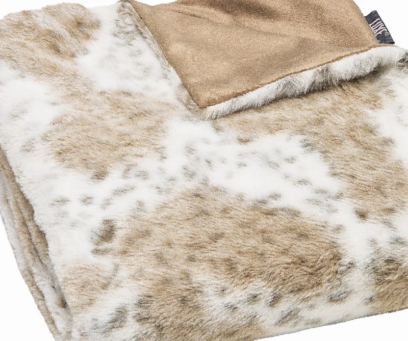 Fleece blankets for a cozy and plush textureBrown & White Spotted Faux Fur Blanket