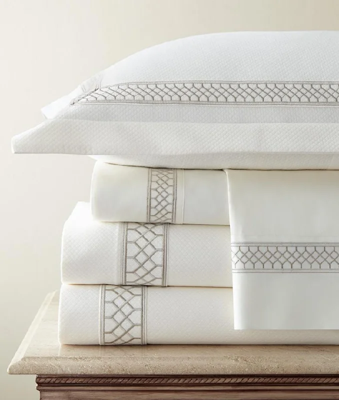 Wrinkle - resistant duvet covers for a neat and tidy lookLangston Embroidered Bedding by Legacy Home