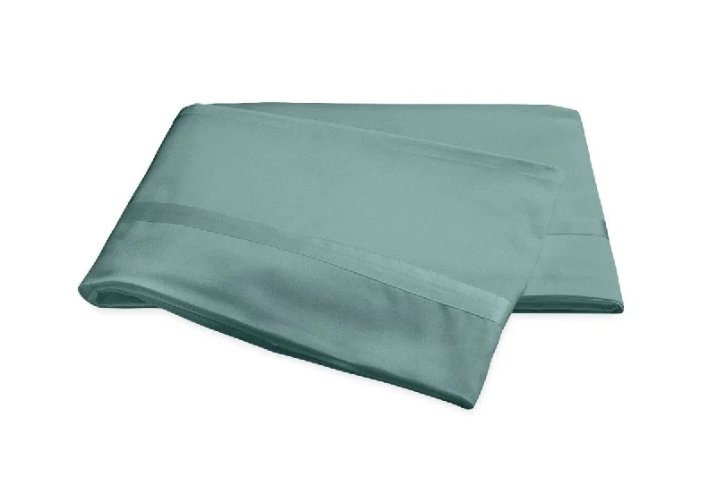 Wrinkle - resistant duvet covers for a neat and tidy lookMatouk Nocturne Sateen Bedding in Aquamarine