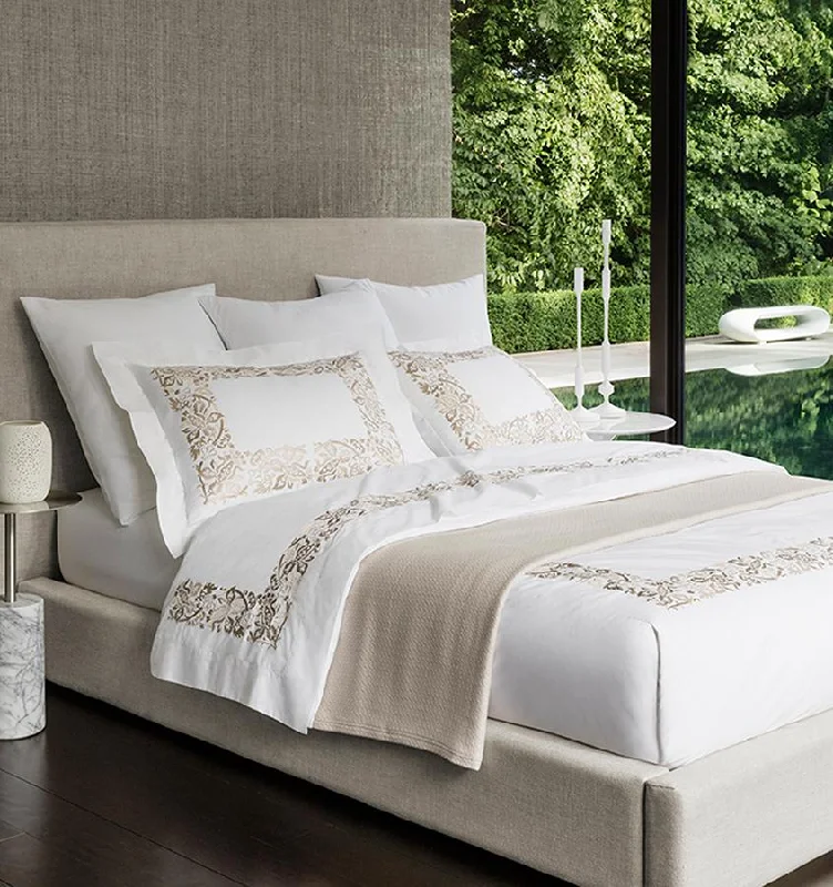 Oversized duvet covers that drape beautifully over the sides of the bed for a luxurious lookSaxon Bedding by Sferra