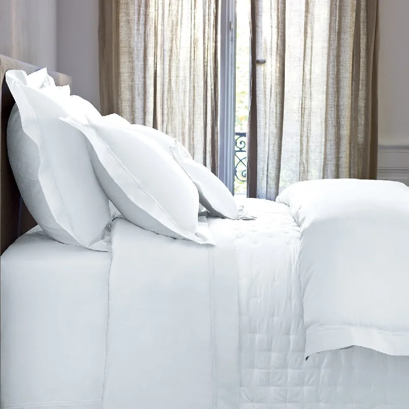 Thermal - regulating duvet covers to keep you warm in winter and cool in summerTriomphe White Bedding by Yves Delorme