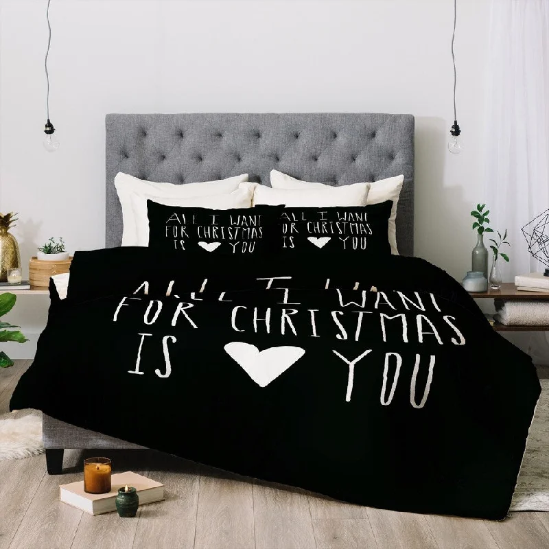 Microfiber - filled comforters that are lightweight and easy to care forDeny Designs All I Want For Christmas 3-Piece Comforter Set